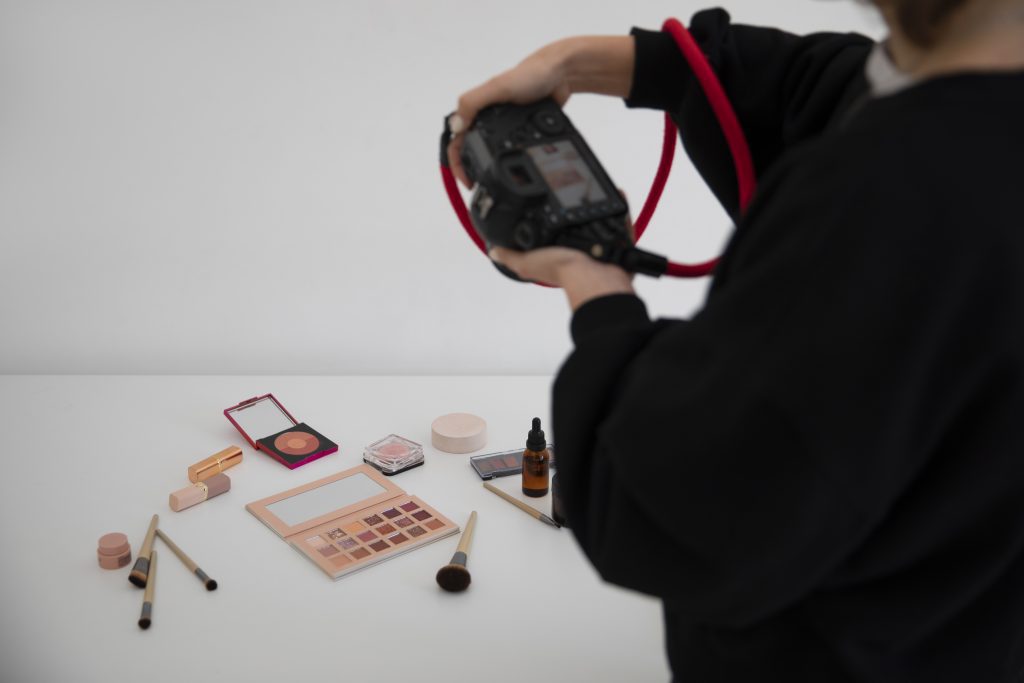 side view woman working photography studio.